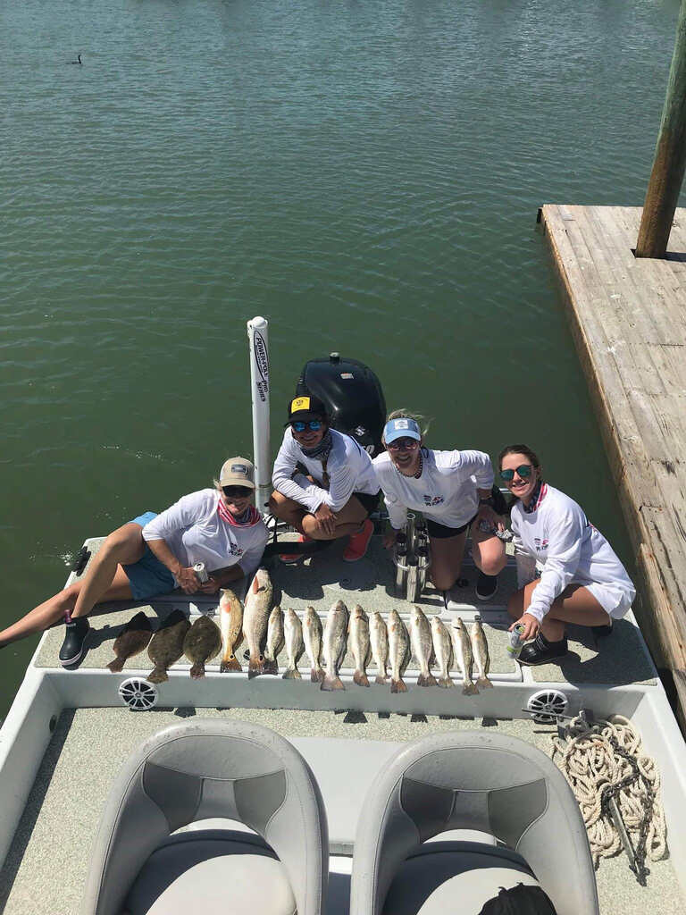  Posing with fish caught on boat