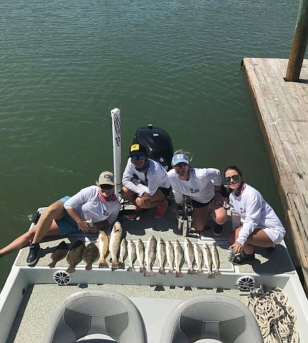  Posing with fish caught on boat